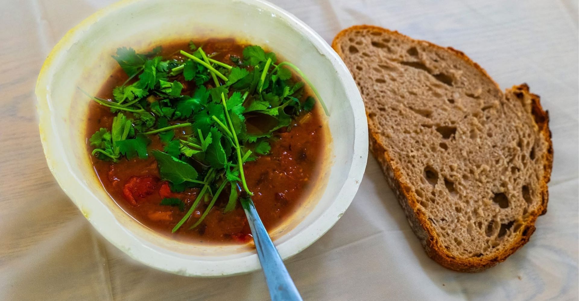 handmade bowl with soup and bread